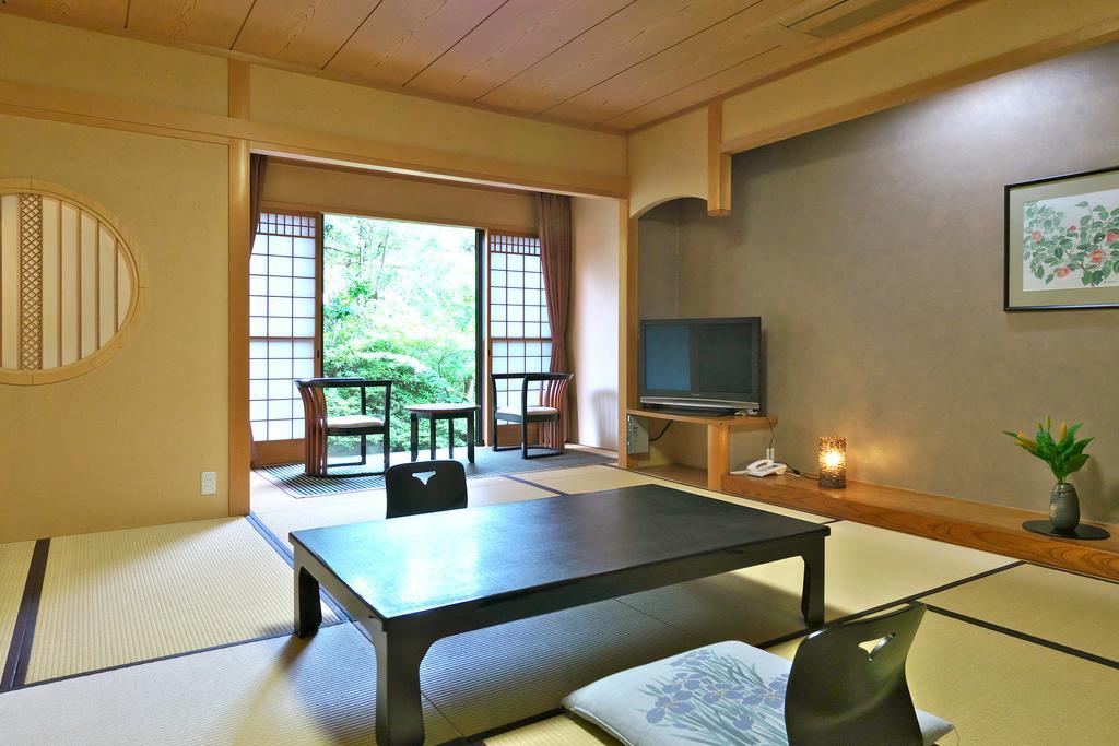 Yuraku Hotel Awara Phòng bức ảnh